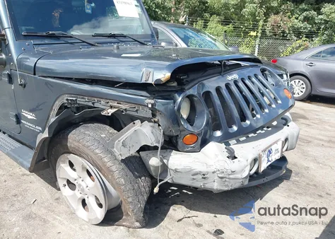 2007 Jeep Wrangler Unlimited Sahara z USA, uszkodzony, nr VIN 1J4GB59117L111449